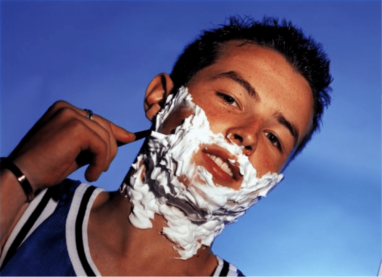 the teenager shaves and thinks about penis enlargement