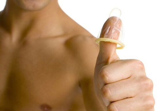 the condom on the finger symbolizes the enlargement of the adolescent penis